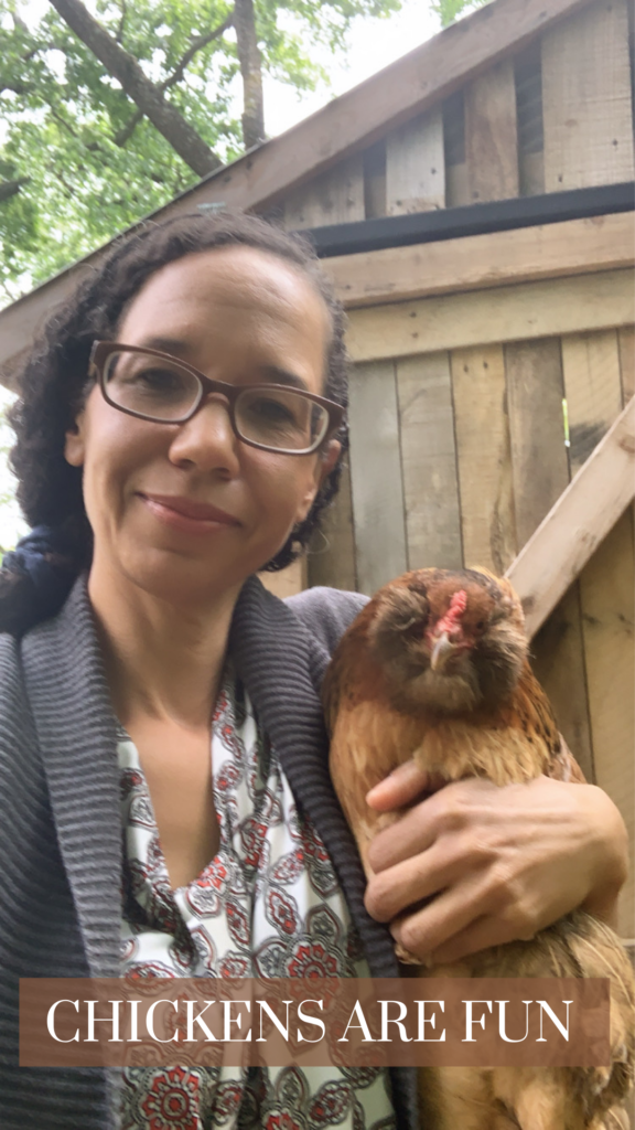 Woman with a chicken.